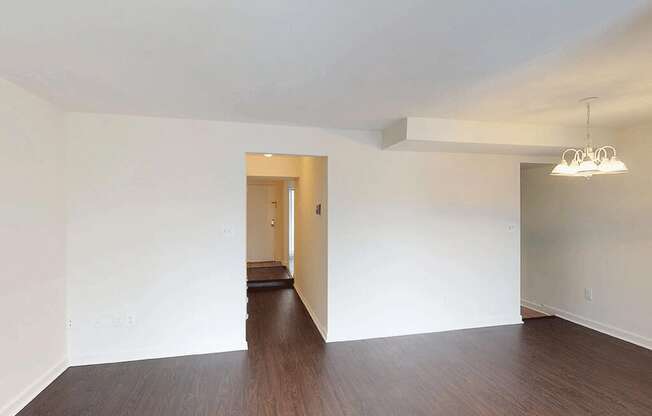 Spacious living space with vinyl flooring at Trillium Apartments, Virginia