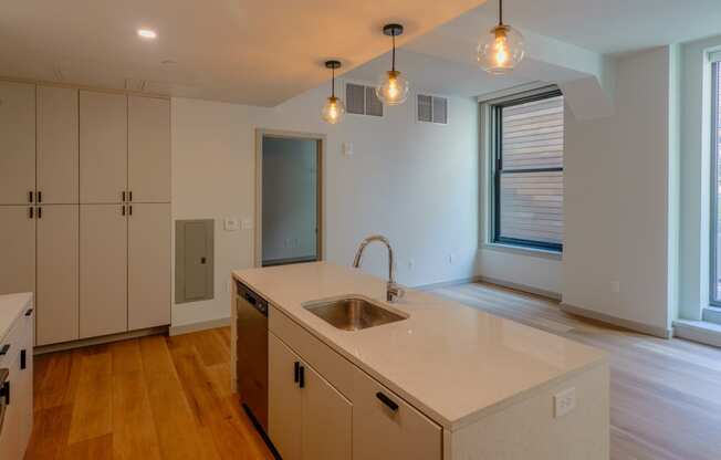 a kitchen with a sink and a window at The Commonwealth Building, Pittsburgh, 15222