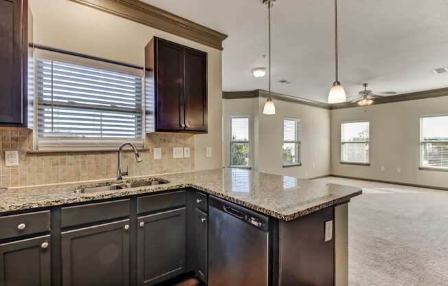 Fully-Equipped Kitchen with Granite Countertops