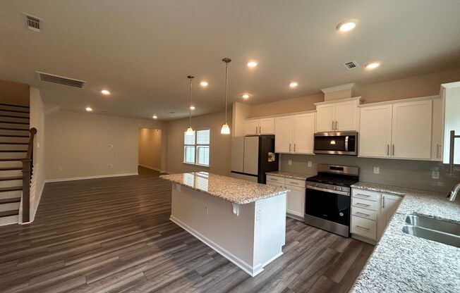 Stunning end-unit newly built 3 bedroom 2.5 bath townhouse in N High Point with attached garage.