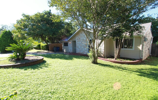 Southeast Austin Home with Vaulted Ceilings, Bonus Room & Private Backyard