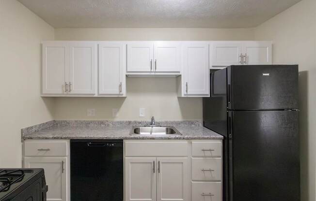This is a photo of the kitchen in the 543 square foot A-style, 1 bedroom, 1 bath apartment at Blue Grass Manor Apartments in Erlanger, KY.