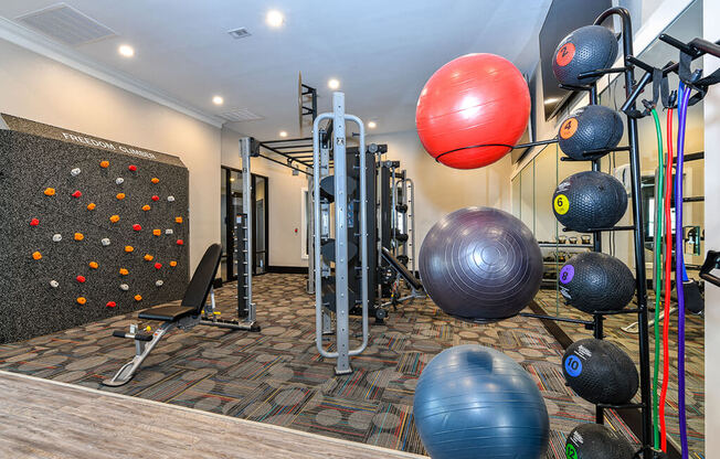 Fitness studio with rock wall at Artesian on Westheimer, Texas, 77077
