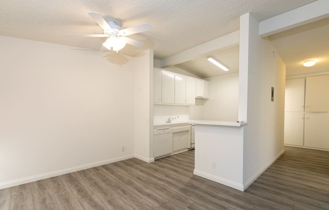 Dining Room with Hardwood Floors and Fan