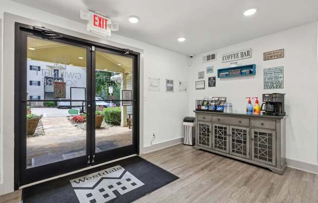 A leasing office with a coffee bar at Gwinnett Square Apartments in Duluth, GA