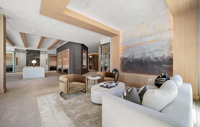 Lobby lounge with curated artwork, plush seating, and refined modern design