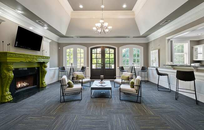 Modern Clubhouse with seating located at St. Andrews Apartments in Johns Creek, GA 30022