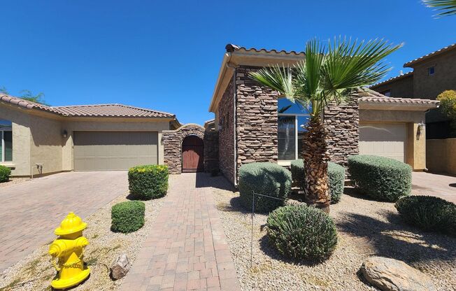 Gated community single level home within the Palm Valley golf course