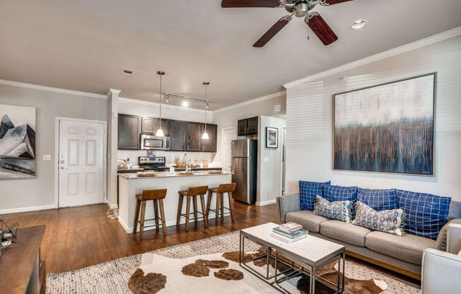 a living room with a couch and a table