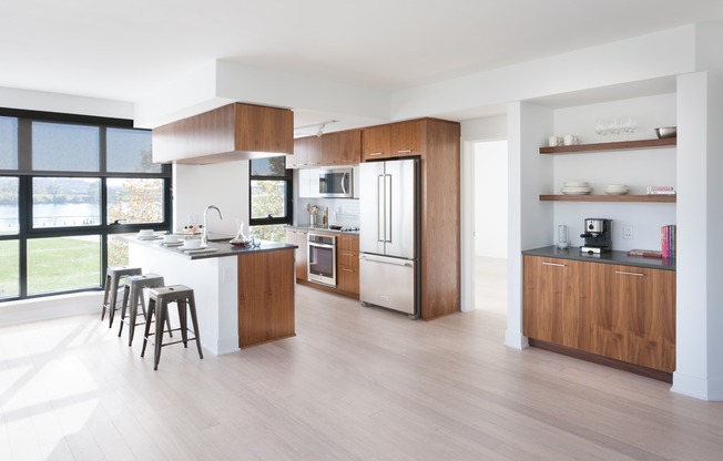 Open kitchens with sleek layouts and stainless steel appliances