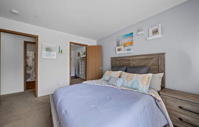 Spacious bedroom with ample storage space at Woodland Villa Apartments in Westland, MI.