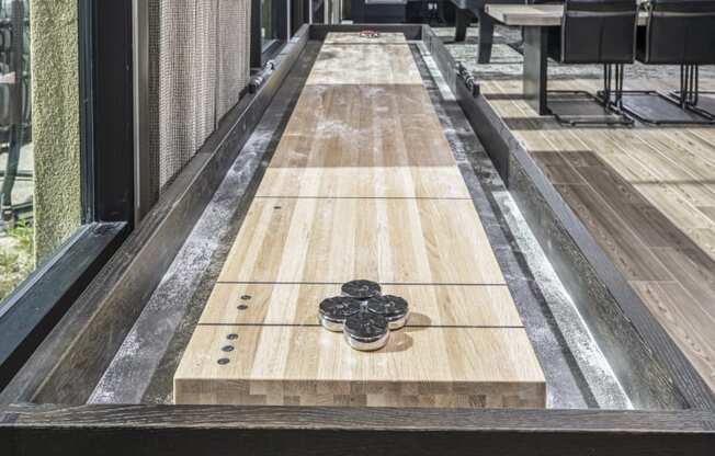 Icon at Cooley Station-clubhouse with indoor shuffleboard game