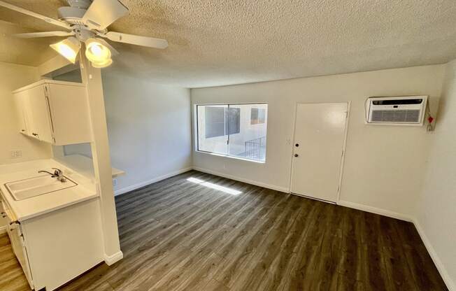 Dining Room with Hardwood Floors and Fan