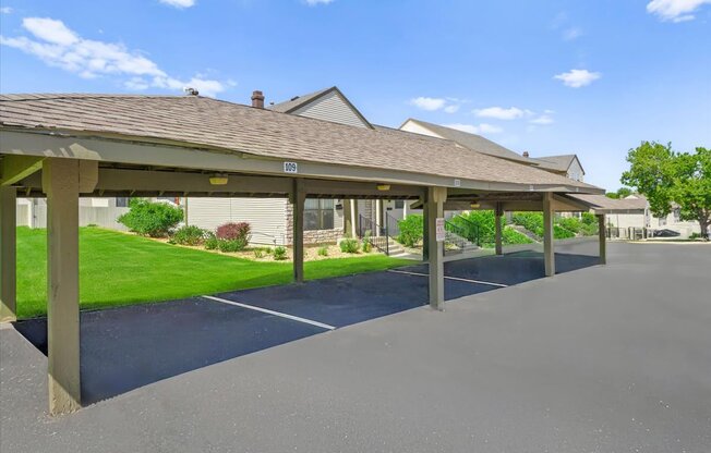 A parking lot with a building in the background.