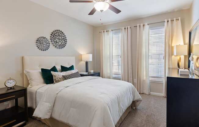 Master bedroom with bed at The Berkeley Apartments, Georgia, 30096