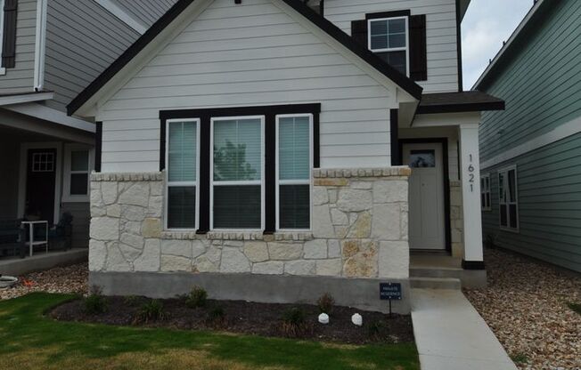 Enjoy a lock and leave lifestyle in this brand new cottage style home at The Retreat at Hero Way