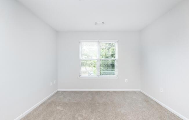 a room with a sink and a window