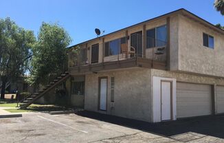 2 BEDROOM 1 BATH UPSTIARS UNIT WITH BALCONY FRONT AND BACK