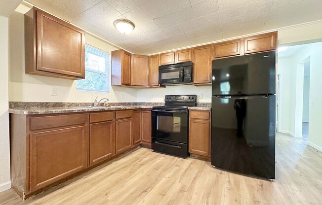 Pet Friendly 3 Bedroom Charmer located behind Corbett Field!