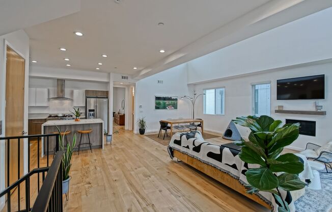 Custom, Modern & Spacious Tri-Level Home w/ Amazing Great Room Living Space, 4 Balconies/Decks, Ocean Views & 2-Car Garage Close to Schools, Restaurants, Shopping & Just 4 Blocks to Beach!