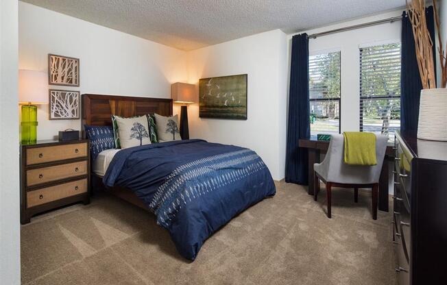 Large bedroom with plush carpeting at Creekfront at Deerwood, Jacksonville, 32256