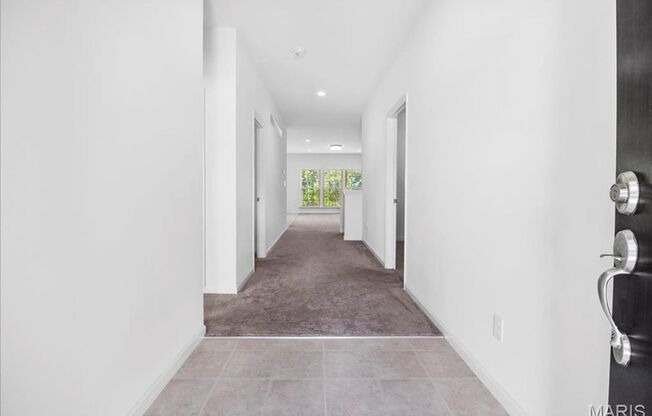 Stunning 3-bedroom, 2.5-bathroom home offers a spacious, open-concept floor plan