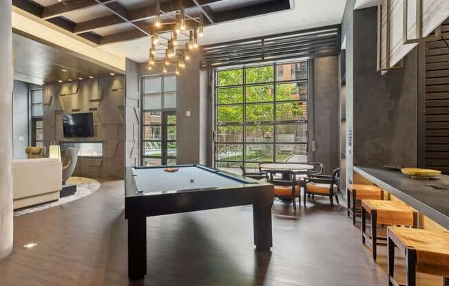 a pool table in the middle of a living room
