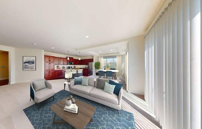 A living room with a grey couch and a coffee table.