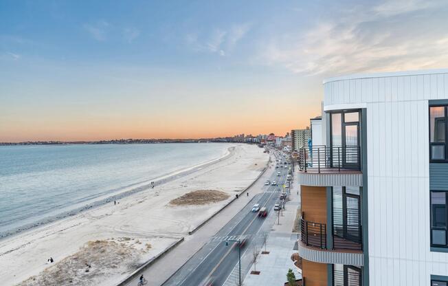Sunrise views over Revere Beach and direct access to the shoreline just outside your door.