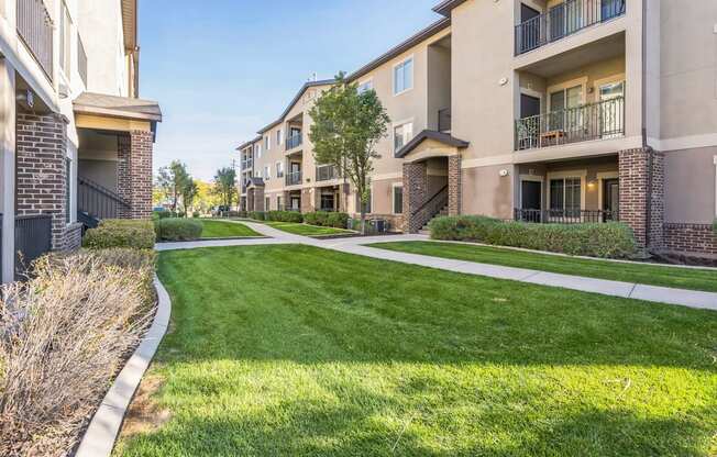 the preserve at ballantyne commons exterior of apartments with grass