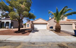 Single story home with tile and vinyl plank flooring.