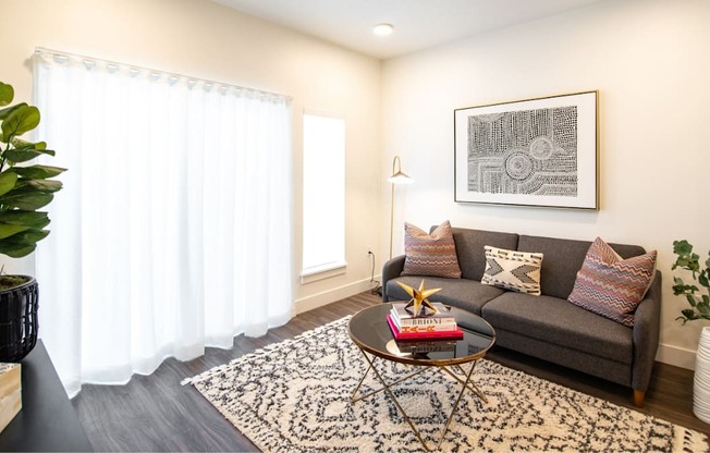 a living room with a couch and a coffee table