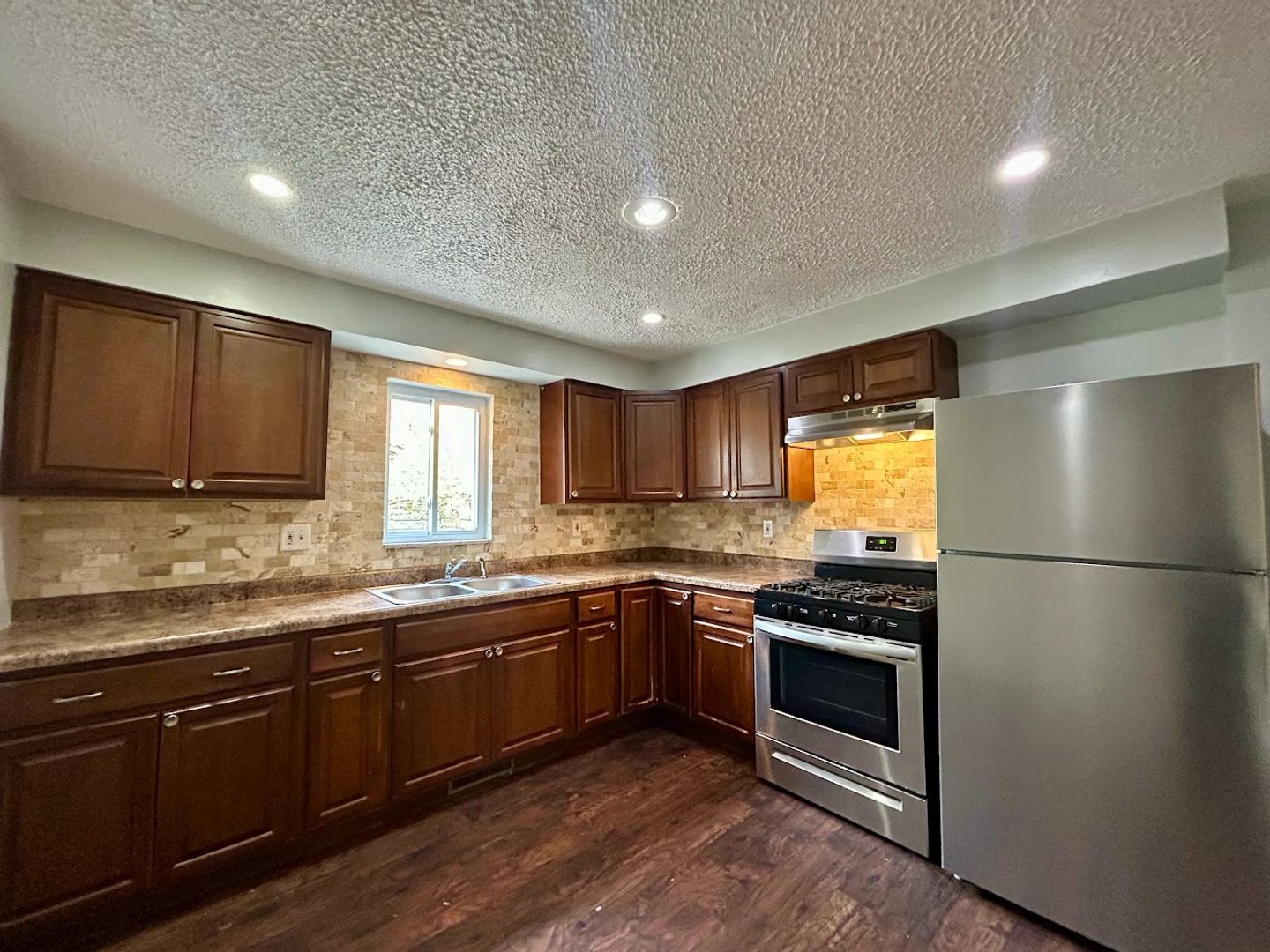 AVAILABLE NOW! 3 Bedroom Home with Fenced  Back Yard near Riverview Park!