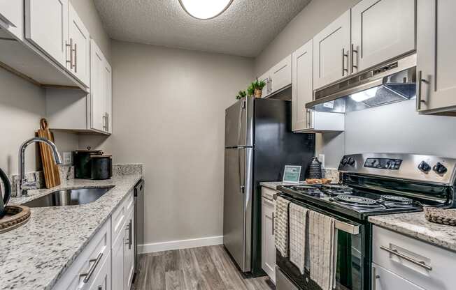 an updated kitchen with stainless steel appliances.