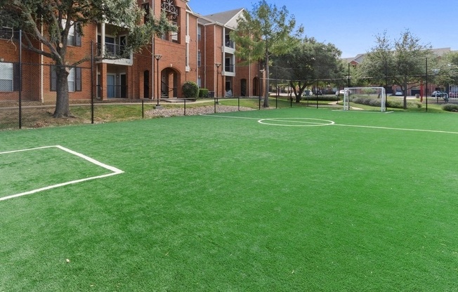 Soccer field in chain-link fence area