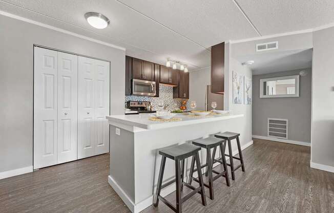 Renovated Kitchen with white interior at Woodland Ridge Apartments in Woodridge, IL