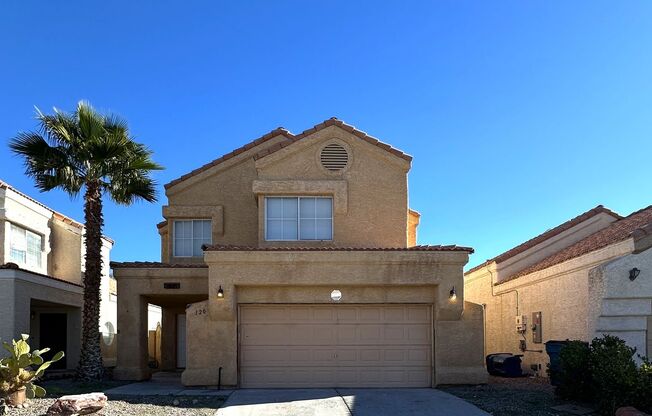 Newly renovated home with brand new kitchen and flooring downstairs! Home features a large living room with a fireplace and a separate family room! Brand new large kitchen cabinets and countertops! A large backyard! And is nearby the Summerlin Parkway hig
