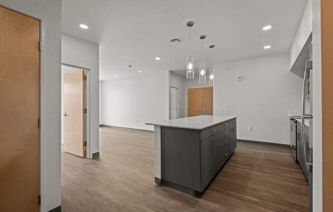 Kitchen with Island and cabinets at Ironside Apartments, Washington