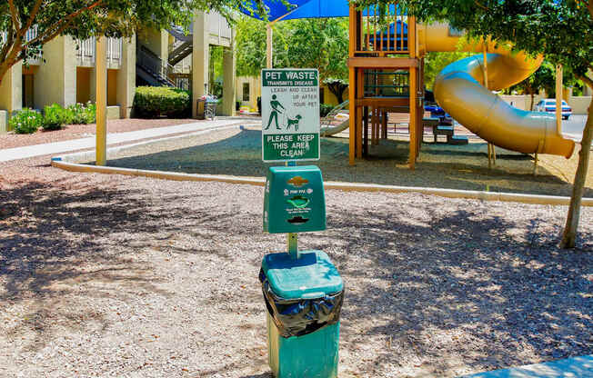 a street sign in the middle of a park