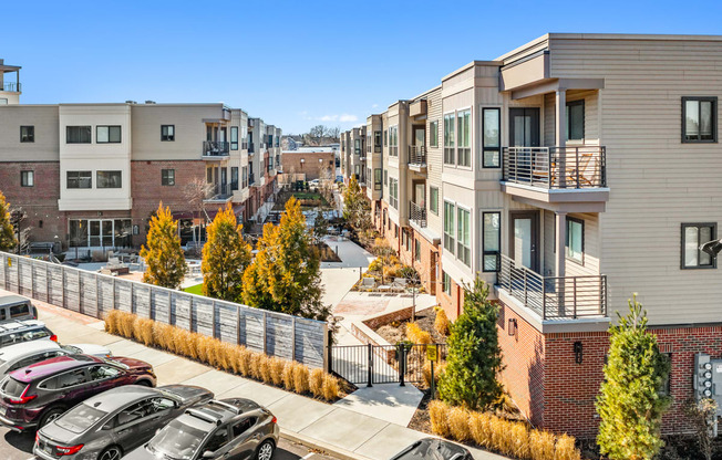 Lansdale Station Apartments exterior photo of landscaping and balconies