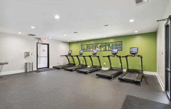 Community Fitness Center with Treadmills and Water Fountain at Dunwoody Village Apartments in Atlanta, GA.
