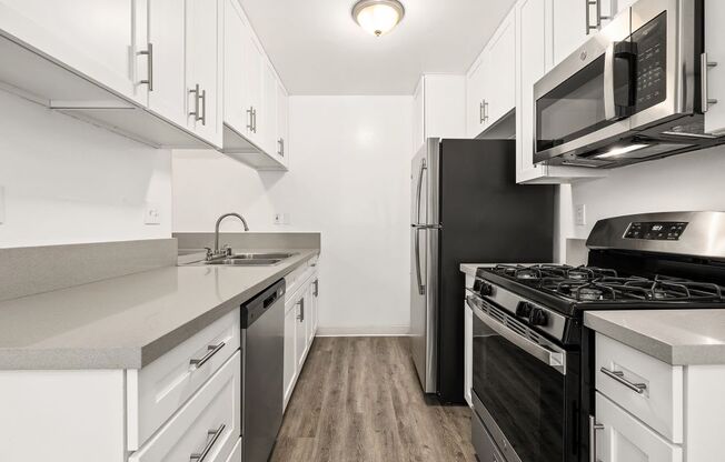 Marina Del Rey Apartments for Rent - Casa De Marina- Kitchen with Stainless-Steel Appliances, Spacious Countertops, and White Cabinets