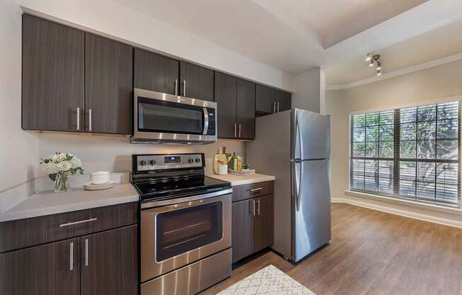 Large Island Kitchen With Custom Cabinetry at Sedona Springs, Texas