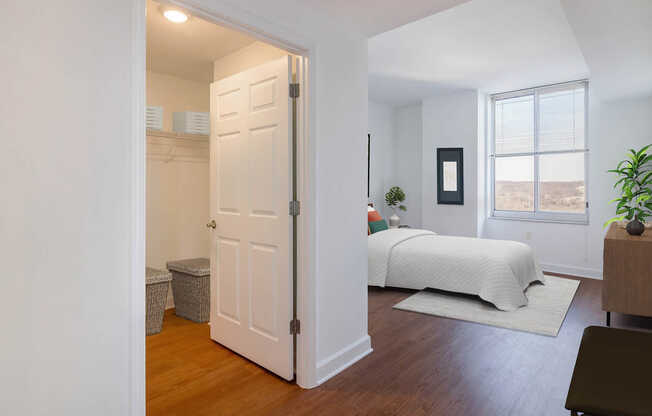 Bedroom with Hard Surface Flooring and Walk-in Closet