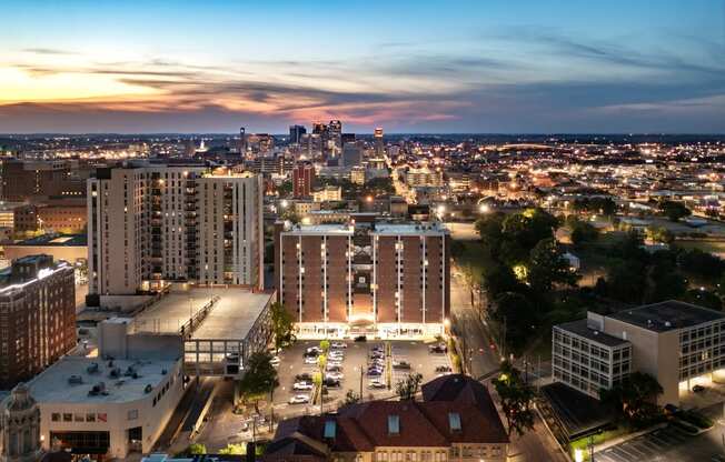 a cityscape at night with the downtown houston skyline in the background