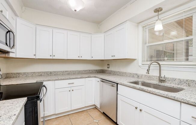 Modern Vibes & Maximum Convenience in the Heart of Virginia Beach Living in this 4BR/2.5BA Townhome