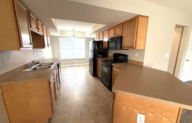 LARGE 2 Bedroom 2 1/2 Bath Townhome with Full Finished Basement and 1 Car Garage Located in Valley Station