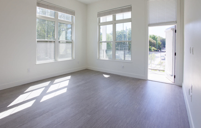 Living Room with Balcony and Hard Surface Flooring