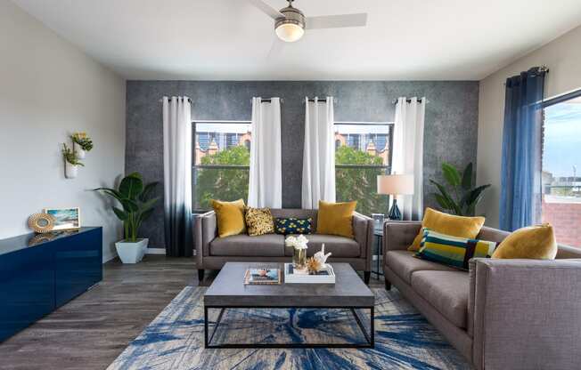 Ample Natural Lighting And Large Windows In Living Rooms At Union at Roosevelt Apartments In Phoenix, AZ