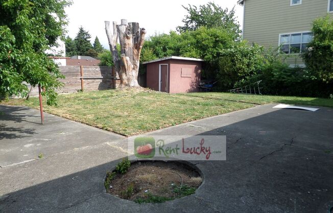 Super-Cute 2-Bedroom Home w/Attached Garage and Large Yard in Great Seattle Location!!